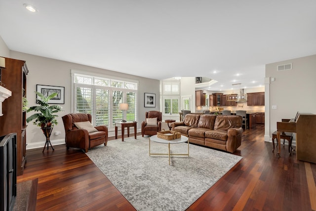 127 60th St, Downers Grove, IL 60516 - living room featuring dark wood finished floors, baseboards, and recessed lighting