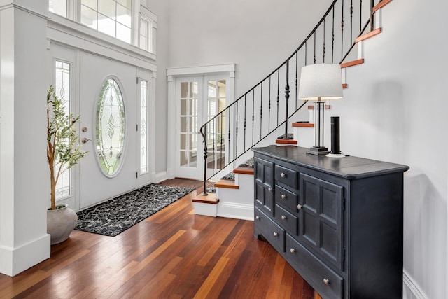 127 60th St, Downers Grove, IL 60516 - foyer entrance featuring dark wood-type flooring, stairs, baseboards, and a towering ceiling