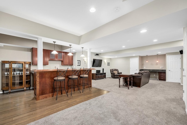 127 60th St, Downers Grove, IL 60516 - kitchen with a breakfast bar, recessed lighting, pendant lighting, open floor plan, and carpet floors