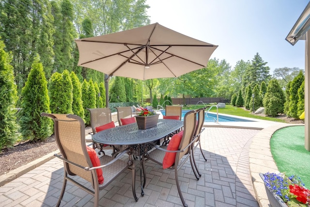 127 60th St, Downers Grove, IL 60516 - view of patio with outdoor dining area and view of scattered trees