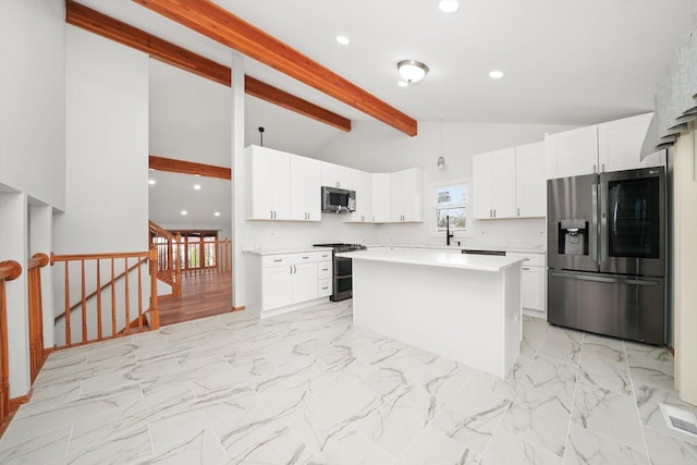 kitchen with a center island, light countertops, beamed ceiling, stainless steel appliances, and white cabinetry