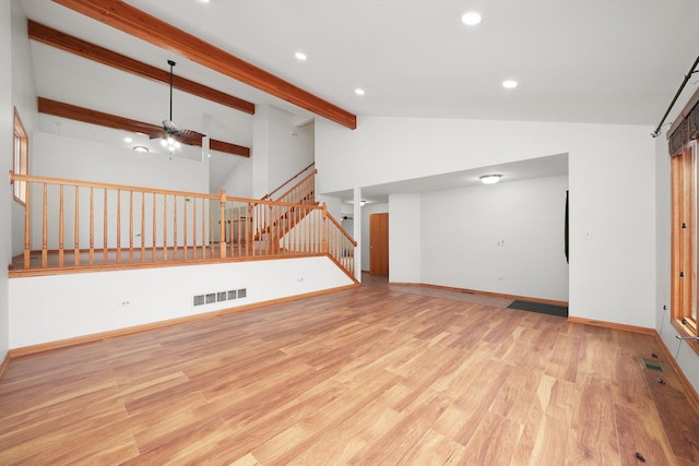 unfurnished living room with ceiling fan, visible vents, stairs, wood finished floors, and recessed lighting