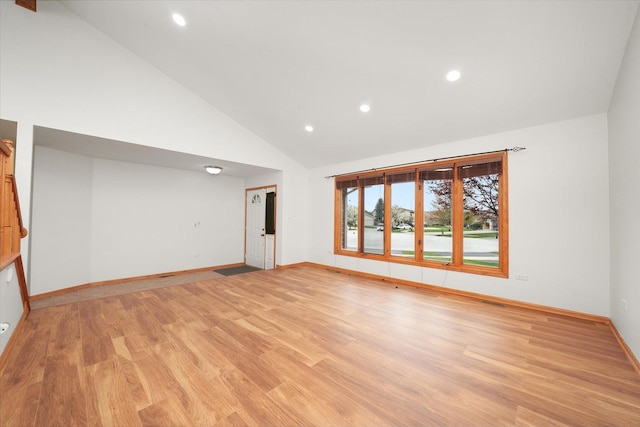 unfurnished living room featuring light wood-style floors, recessed lighting, and baseboards