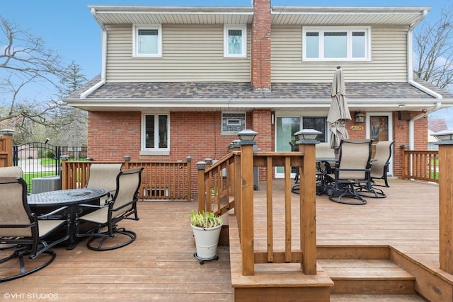 wooden deck with outdoor dining space
