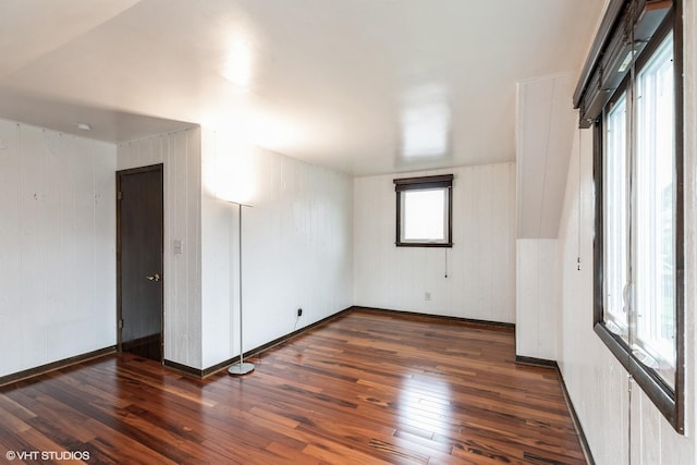 empty room with wood-type flooring