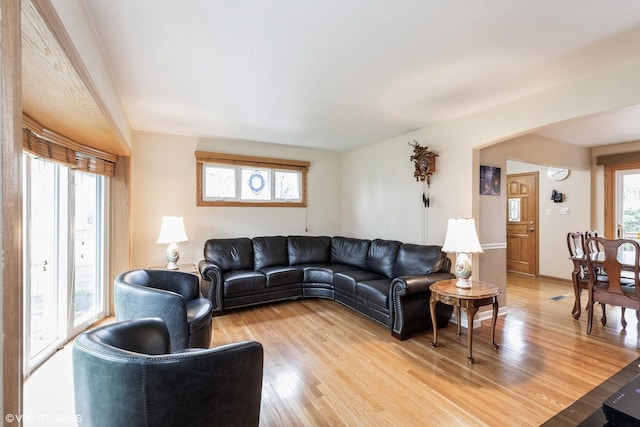 living area with light wood-style floors