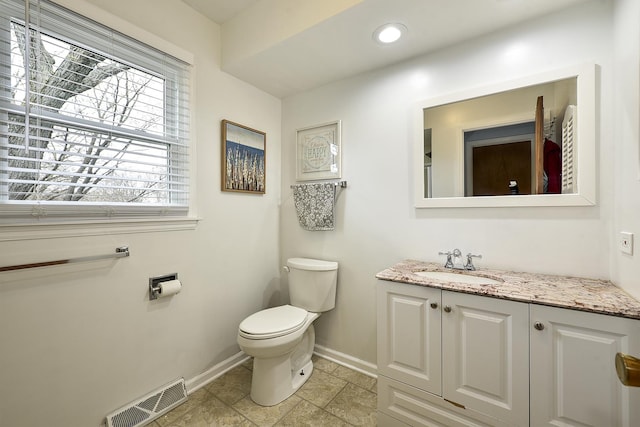 317 Roberts Rd, Inverness, IL 60010 - bathroom with tile patterned floors, visible vents, toilet, vanity, and baseboards