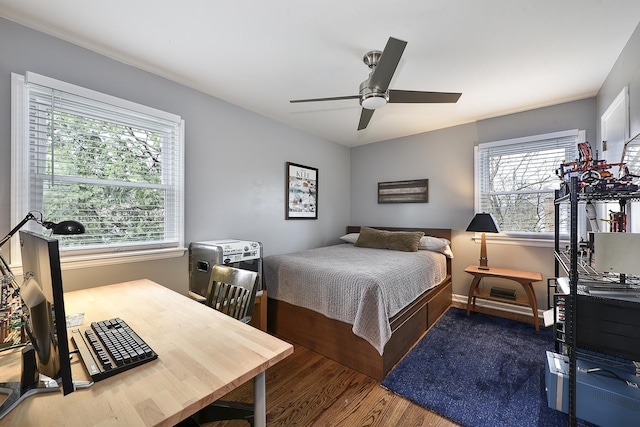 317 Roberts Rd, Inverness, IL 60010 - bedroom featuring baseboards, a ceiling fan, and wood finished floors