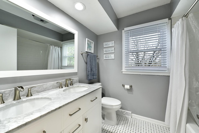 317 Roberts Rd, Inverness, IL 60010 - full bath with toilet, a sink, visible vents, and baseboards