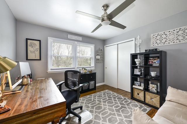 317 Roberts Rd, Inverness, IL 60010 - home office featuring baseboards, a ceiling fan, and wood finished floors