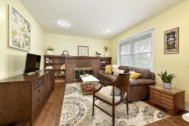 317 Roberts Rd, Inverness, IL 60010 - living area with baseboards, wood finished floors, and a fireplace