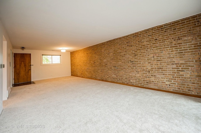 4726 Russet Ln Unit R107, Skokie, IL 60076 - empty room with brick wall, light carpet, and baseboards