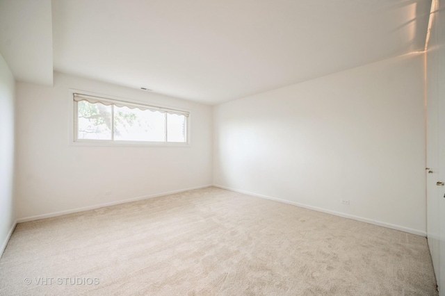 4726 Russet Ln Unit R107, Skokie, IL 60076 - carpeted spare room featuring baseboards