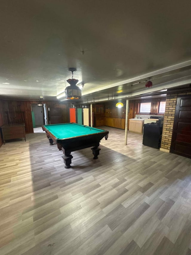 rec room with billiards and light wood-style flooring