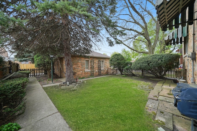 view of yard featuring a fenced backyard