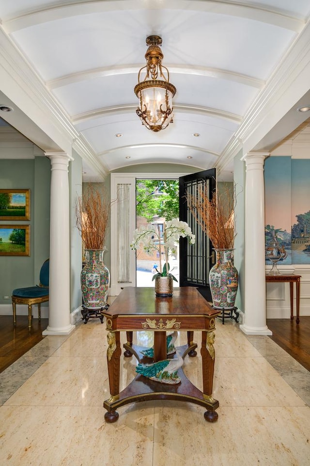 401 W Dickens Ave, Chicago, IL 60614 - interior space with baseboards, a chandelier, and decorative columns