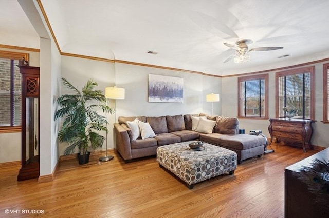 5840 N Saint Louis Ave Unit 2N, Chicago, IL 60659 - living area featuring baseboards, a ceiling fan, visible vents, and light wood-style flooring