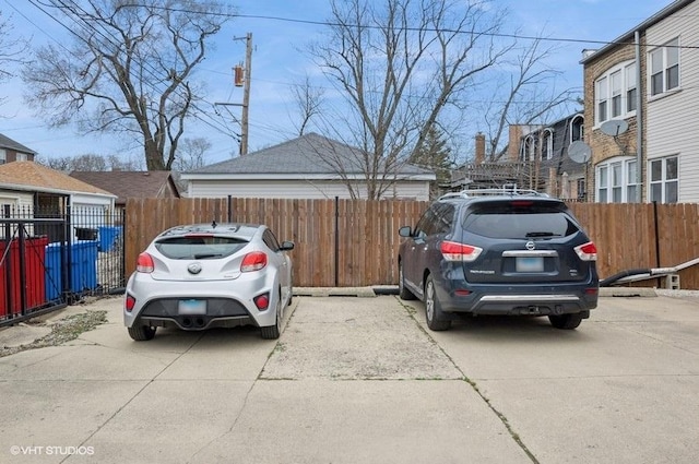 5840 N Saint Louis Ave Unit 2N, Chicago, IL 60659 - view of parking / parking lot featuring fence