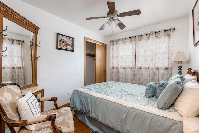 1291 Fargo Ave, Des Plaines, IL 60018 - bedroom featuring baseboards, a ceiling fan, wood finished floors, and a closet