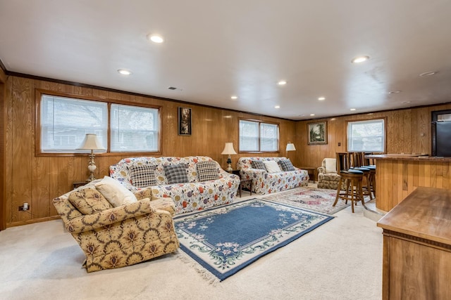 1291 Fargo Ave, Des Plaines, IL 60018 - living area with recessed lighting, carpet floors, a wealth of natural light, and wood walls