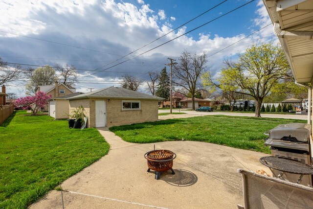 1291 Fargo Ave, Des Plaines, IL 60018 - exterior space featuring an outbuilding and an outdoor fire pit