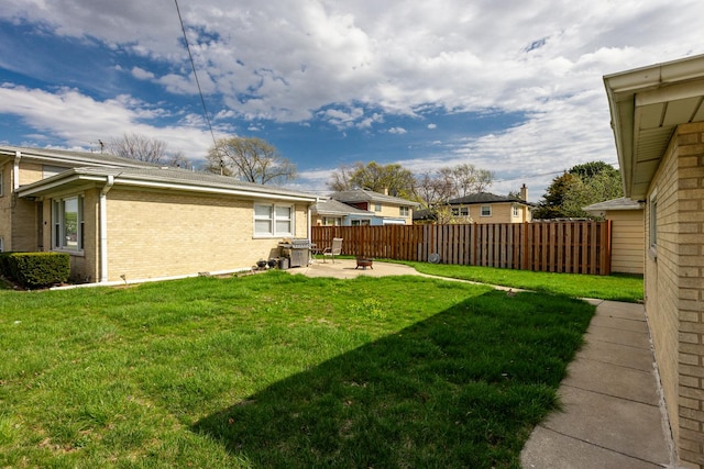 1291 Fargo Ave, Des Plaines, IL 60018 - view of yard featuring a patio area and fence
