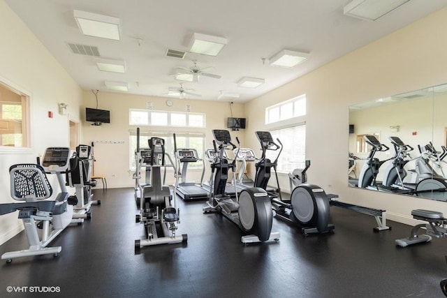 gym featuring ceiling fan, baseboards, and visible vents