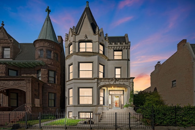 3936 S King Dr, Chicago, IL 60653 - victorian home with a gate and a fenced front yard