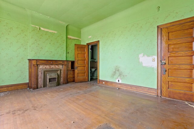 3936 S King Dr, Chicago, IL 60653 - unfurnished living room featuring a high end fireplace and wood finished floors