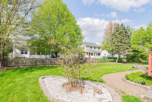 view of yard with a fenced backyard