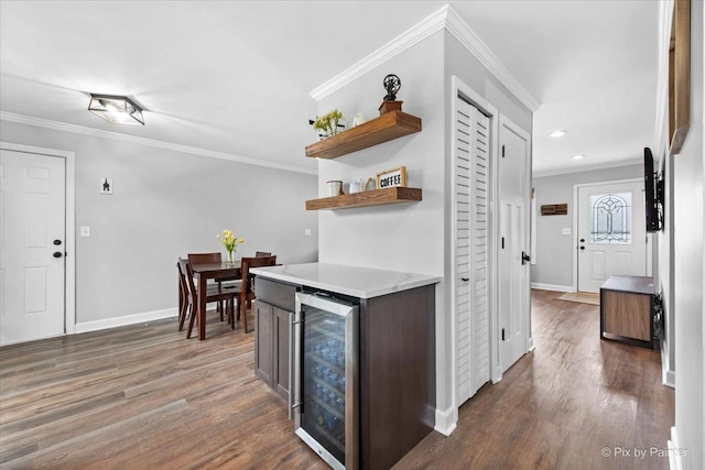 219 E Streamwood Blvd, Streamwood, IL 60107 - kitchen with baseboards, ornamental molding, open shelves, and beverage cooler