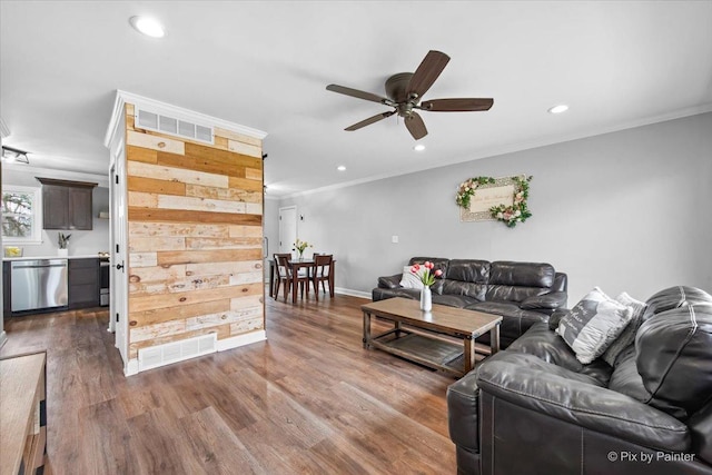 219 E Streamwood Blvd, Streamwood, IL 60107 - living room featuring visible vents, a ceiling fan, dark wood-type flooring, and ornamental molding