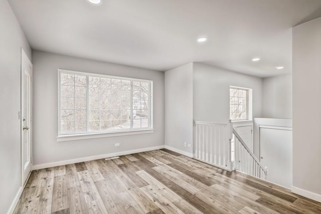 43 S Treehouse Ln, Round Lake, IL 60073 - unfurnished room featuring baseboards, wood finished floors, and recessed lighting