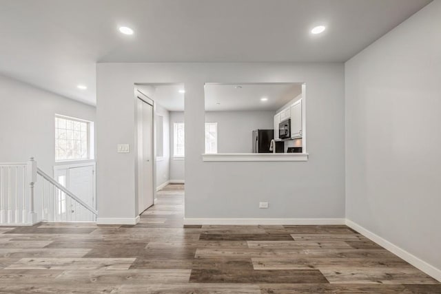 43 S Treehouse Ln, Round Lake, IL 60073 - empty room featuring baseboards, wood finished floors, and recessed lighting
