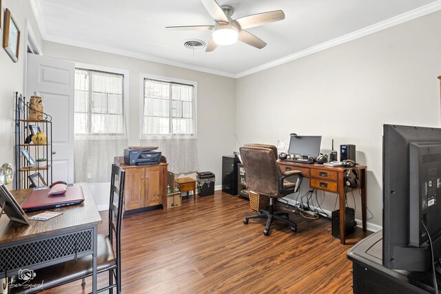 office area with a ceiling fan, visible vents, baseboards, ornamental molding, and wood finished floors