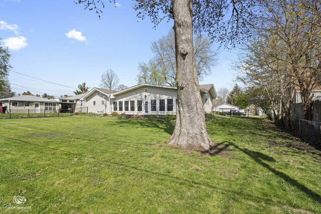view of yard with fence