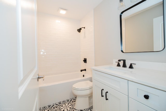 bathroom featuring vanity, tile patterned floors, toilet, and tub / shower combination