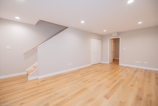 interior space with recessed lighting, stairs, and baseboards