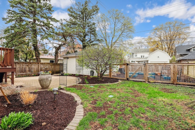 view of yard featuring fence private yard and a patio area