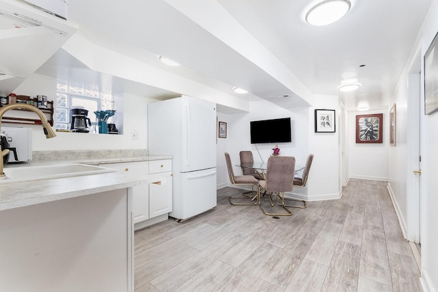 bedroom featuring baseboards and wood finished floors