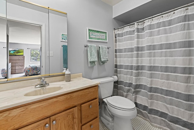 3350 N Carriageway Dr Unit 217, Arlington Heights, IL 60004 - ensuite bathroom with tile patterned flooring, vanity, curtained shower, toilet, and ensuite bath