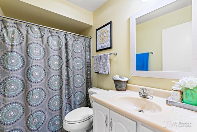 3350 N Carriageway Dr Unit 217, Arlington Heights, IL 60004 - bathroom featuring vanity, curtained shower, and toilet