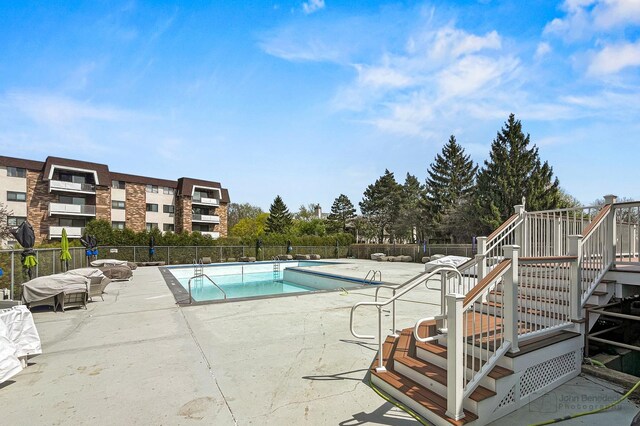 3350 N Carriageway Dr Unit 217, Arlington Heights, IL 60004 - pool featuring fence, stairs, and a patio area