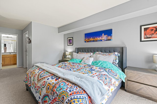 3350 N Carriageway Dr Unit 217, Arlington Heights, IL 60004 - carpeted bedroom with a sink and ensuite bathroom