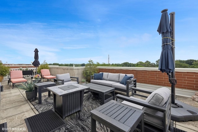 14 S Prospect St Unit 508, Roselle, IL 60172 - view of patio / terrace featuring an outdoor living space with a fire pit