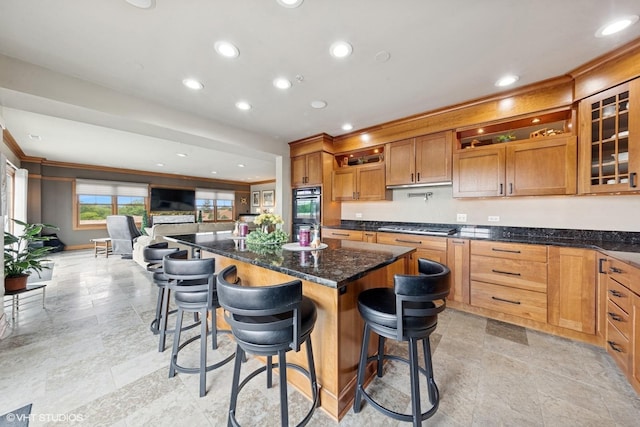 14 S Prospect St Unit 508, Roselle, IL 60172 - kitchen featuring open shelves, a kitchen island, a kitchen bar, glass insert cabinets, and recessed lighting