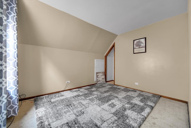 29W395 Greenbriar Ln, Warrenville, IL 60555 - bonus room with vaulted ceiling, baseboards, and carpet flooring