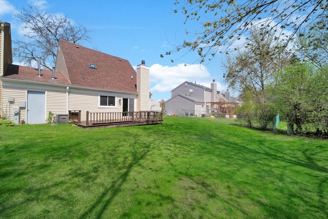 29W395 Greenbriar Ln, Warrenville, IL 60555 - rear view of property with a lawn, central air condition unit, a chimney, and a deck