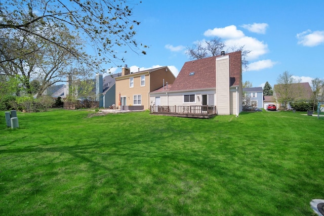 29W395 Greenbriar Ln, Warrenville, IL 60555 - back of property with a wooden deck, a yard, and a chimney