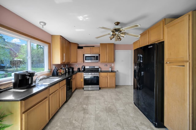 29W395 Greenbriar Ln, Warrenville, IL 60555 - kitchen with a sink, ceiling fan, black appliances, and dark countertops